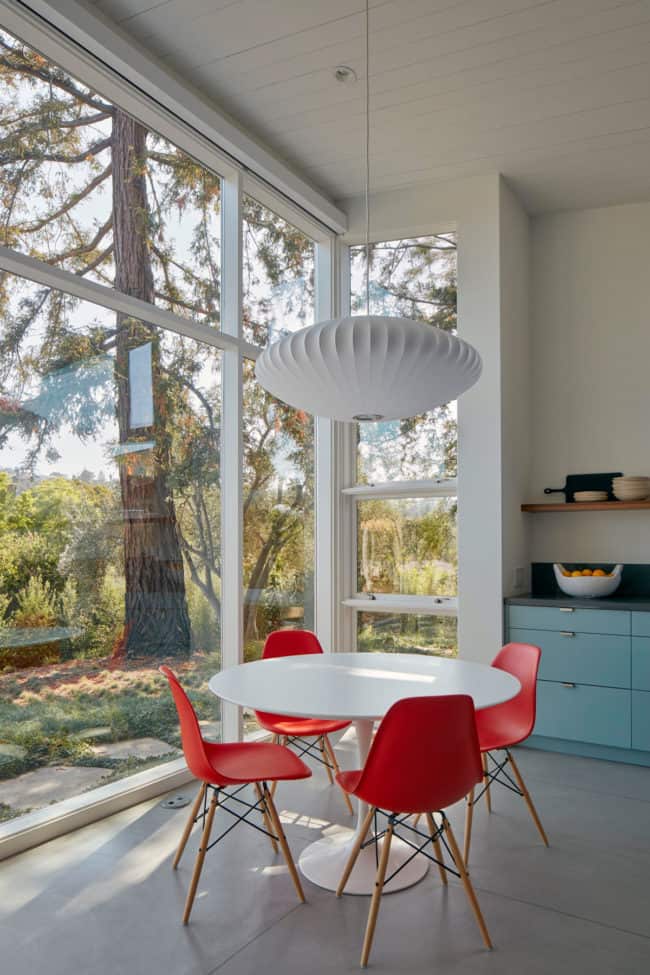 The kitchen nook overlooks the existing mature trees