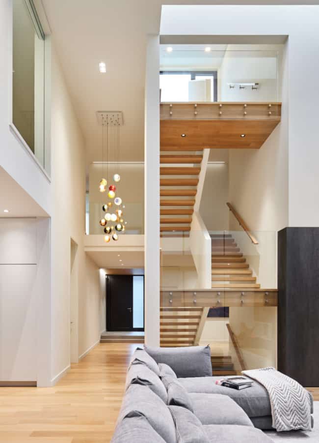 An open stair runs through the centre of the house, overlooking the great room and terminates at the third floor